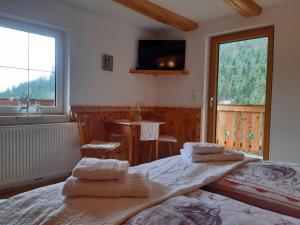 Voodi või voodid majutusasutuse Bed & Breakfast Dolomiti Bey Haus Pinter toas +37 fotot