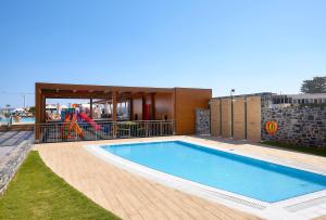 Bazén v ubytování Astir Beach Hotel nebo v jeho okolí