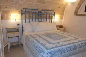 Postel nebo postele na pokoji v ubytování PLAZACARRISI HOTEL & SPA