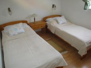 Postel nebo postele na pokoji v ubytování HOLIV Apartman