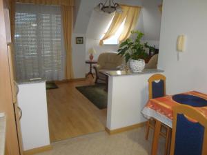 Posezení v ubytování HOLIV Apartman