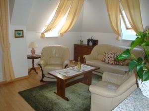 Posezení v ubytování HOLIV Apartman