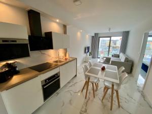 Kuchyň nebo kuchyňský kout v ubytování Fischer Apartments + 9 fotografií