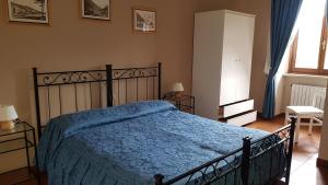 Postel nebo postele na pokoji v ubytování Albergo ristorante Da Tunon