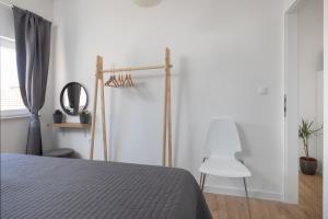 Ein Bett oder Betten in einem Zimmer der Unterkunft Apartments Left & Right with jacuzzi, 4 stars