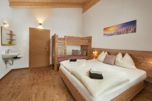 Posteľ alebo postele v izbe v ubytovaní Ferienhaus Rohrmoos Maria Alm