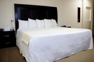 Letto o letti in una camera di Best Western Real Tula Express