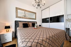 Gulta vai gultas numurā naktsmītnē Lauris Luxury Apartment Zadar