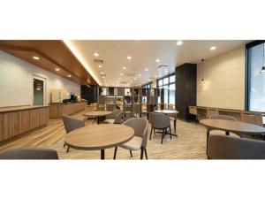 a restaurant with tables and chairs and a cafeteria at R&B Hotel Nagoya Ekimae - Vacation STAY 38775v in Nagoya +10 photos