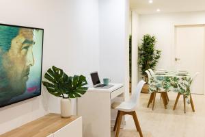 Televízia a/alebo spoločenská miestnosť v ubytovaní Apartment EL Médano Experimental Beach