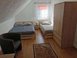 Postel nebo postele na pokoji v ubytování Domki u Bogdana