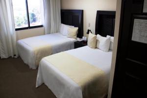 Letto o letti in una camera di Best Western Real Tula Express