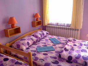 Postel nebo postele na pokoji v ubytování Hostel M