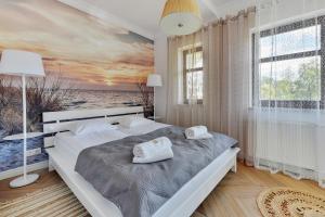 Posteľ alebo postele v izbe v ubytovaní Ocean Mint - Apartamenty przy plaży
