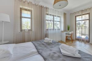 Posteľ alebo postele v izbe v ubytovaní Ocean Mint - Apartamenty przy plaży