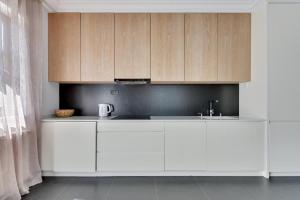 Kuchyňa alebo kuchynka v ubytovaní Ocean Mint - Apartamenty przy plaży