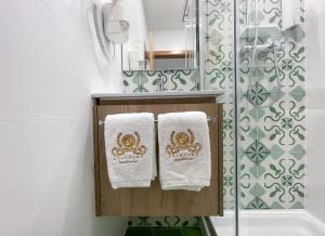 Kylpyhuone majoituspaikassa Soldouro Train Suites