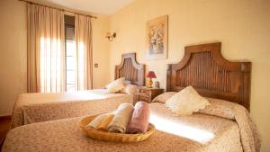 Postel nebo postele na pokoji v ubytování Casa Rural Santa Elena