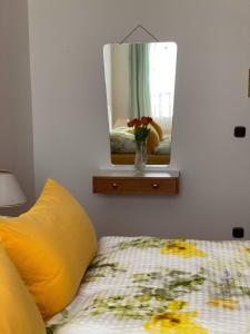 A bed or beds in a room at ALTSTADT-APARTMENTS Bad Radkersburg - Ihr Zuhause auf Reisen