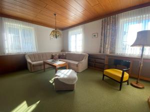 A seating area at ALTSTADT-APARTMENTS Bad Radkersburg - Ihr Zuhause auf Reisen