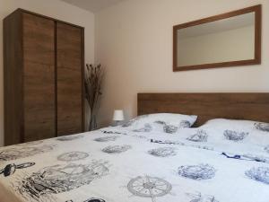 Postel nebo postele na pokoji v ubytování APARTMENT SANJA