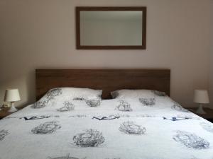 Postel nebo postele na pokoji v ubytování APARTMENT SANJA