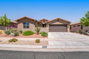 a house with a driveway and a garage at Red Rock Ranch Retreat: Paradise Village #10 in Santa Clara