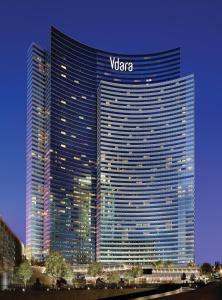 a tall building with a vlora sign on it at Vdara Hotel & Spa at ARIA Las Vegas in Las Vegas