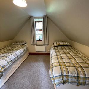 Postel nebo postele na pokoji v ubytování Mawenyoupe