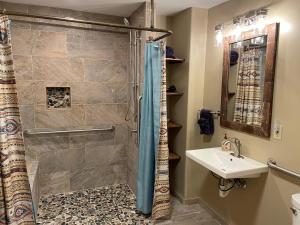 a bathroom with a shower and a sink at Bobcat Inn in Santa Fe +44 photos