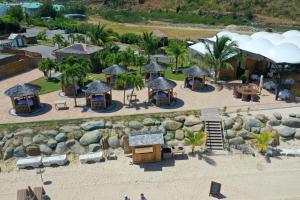 an aerial view of a resort on the beach at Le Domaine Anse Marcel Beach Resort in Anse Marcel  +37 photos