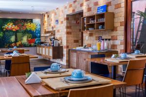 Um restaurante ou outro lugar para comer em Pousada Refúgio de Maresias