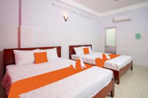 Postel nebo postele na pokoji v ubytování Thadico 3 Hotel