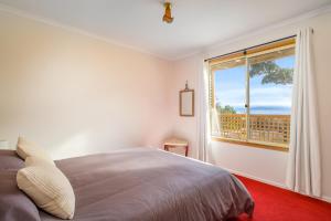 Postel nebo postele na pokoji v ubytování Bruny Island Escapes and Hotel Bruny