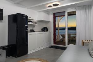 Η κουζίνα ή μικρή κουζίνα στο Peter's Sea and Sαnd Residence
