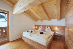 Posteľ alebo postele v izbe v ubytovaní Ferienhaus Rohrmoos Maria Alm