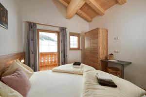Posteľ alebo postele v izbe v ubytovaní Ferienhaus Rohrmoos Maria Alm