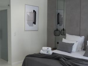 Posteľ alebo postele v izbe v ubytovaní EL Apartments - Aries