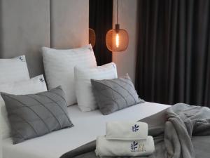 Posteľ alebo postele v izbe v ubytovaní EL Apartments - Aries