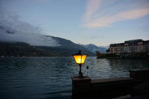 a light in the middle of a body of water at Panorama-Apartment Fürth in Aufhausen