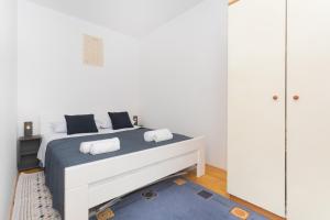 Posteľ alebo postele v izbe v ubytovaní Downtown apartment Danica