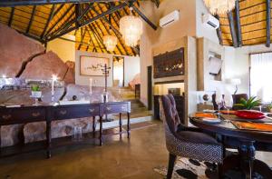 A restaurant or other place to eat at Twyfelfontein Country Lodge