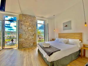 Posteľ alebo postele v izbe v ubytovaní Mirandoalaconcha Rooms