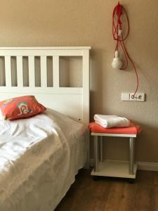 Un pat sau paturi într-o cameră la Gasthaus Schwanen