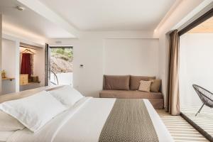 Posteľ alebo postele v izbe v ubytovaní Kefalonian Escape Suites