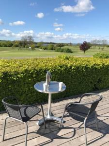 A garden outside Møn Golf Resort - Hotel Præstekilde