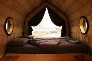 Postel nebo postele na pokoji v ubytování Hara Sadama iglukämping