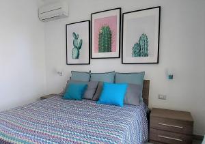 Voodi või voodid majutusasutuse Dreaming Sorrento Suites toas
