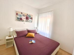 Postel nebo postele na pokoji v ubytování Apartments Antons