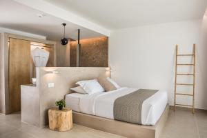Posteľ alebo postele v izbe v ubytovaní Kefalonian Escape Suites
